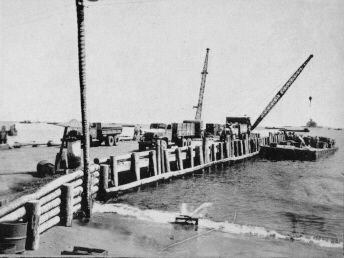 Pier construction by the 26th Seabees at Lunga Point, Guadalcanal.