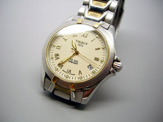 TISSOT 1853 PR100 TWO TONE SAPPHIRE CRYSTAL DATE BOY SIZE QUARTZ WATCH 