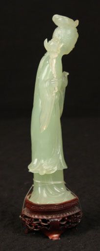 The jade figure measures about 7high (without stand), 3 wide and 2 