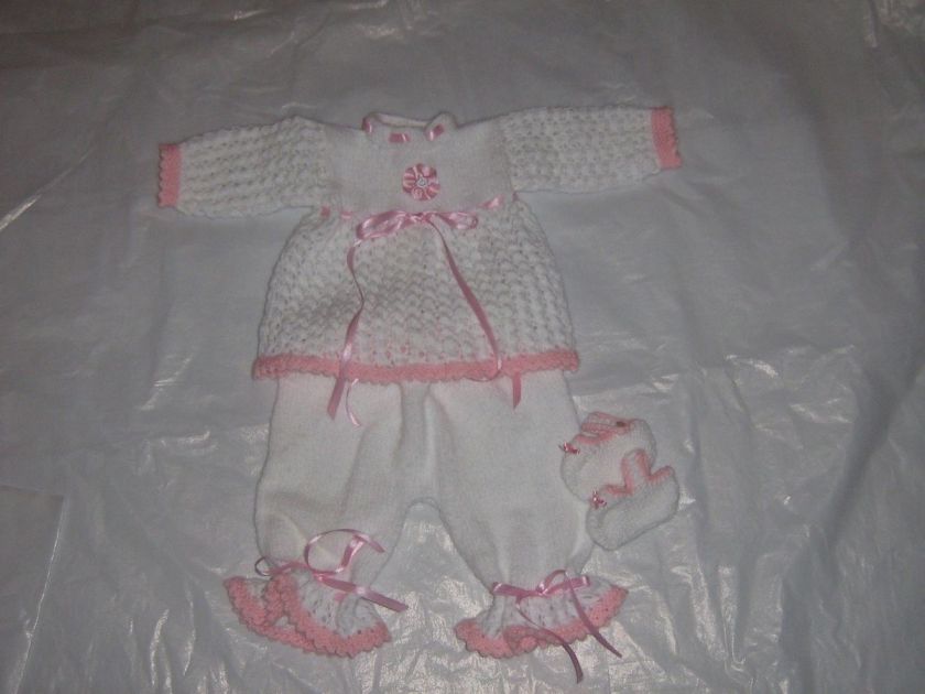 Hand knitted baby girl cardigan, pants and shoes  